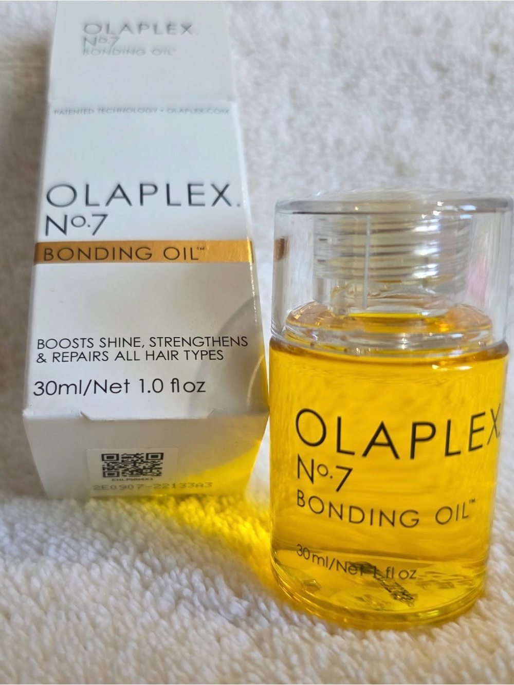 OLAPLEX No.7 Bonding Oil - Yellow and Clear Bottle